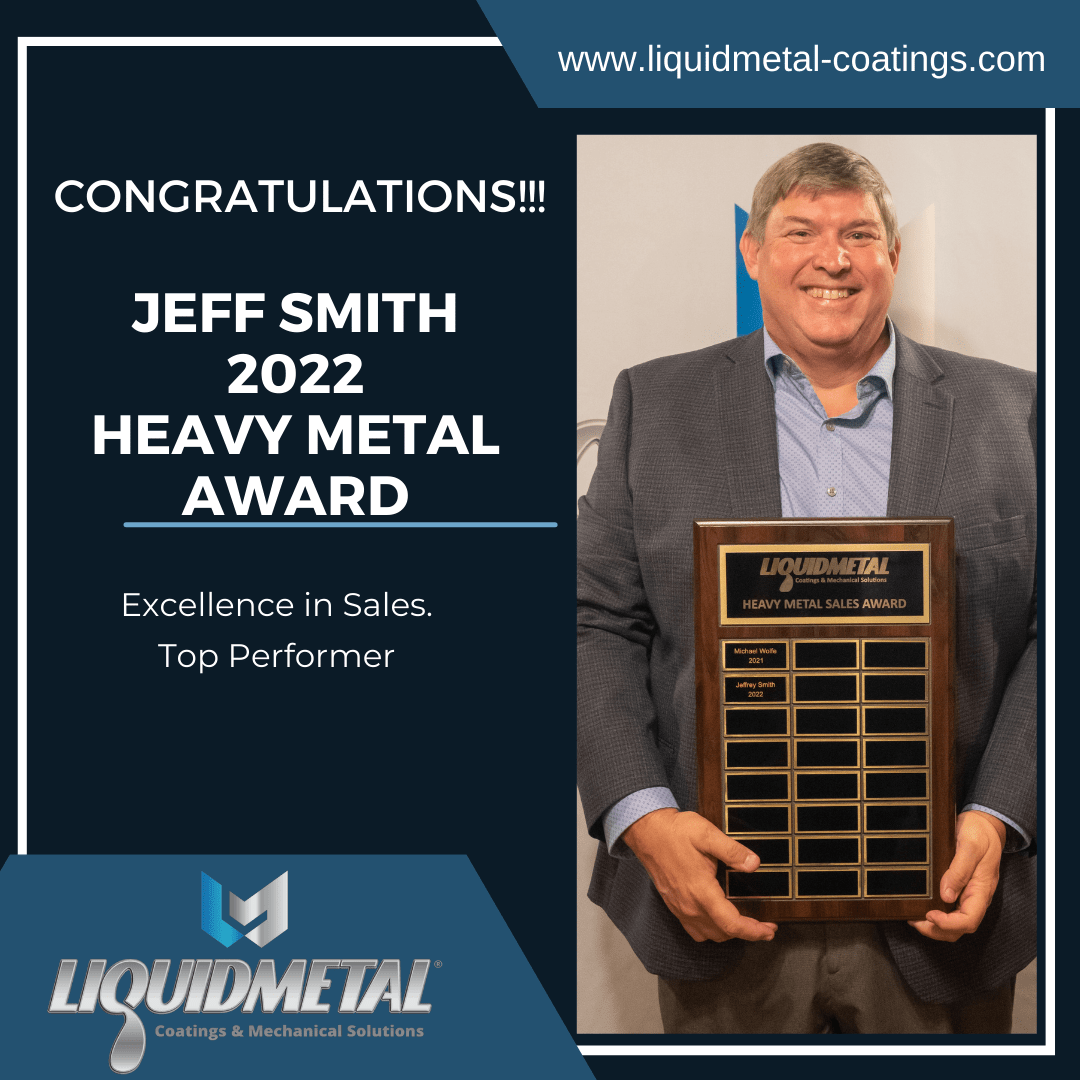 Jeff Smith Hold a Heavy Metal Award
